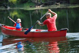Father and son special time in complimentary canoe.